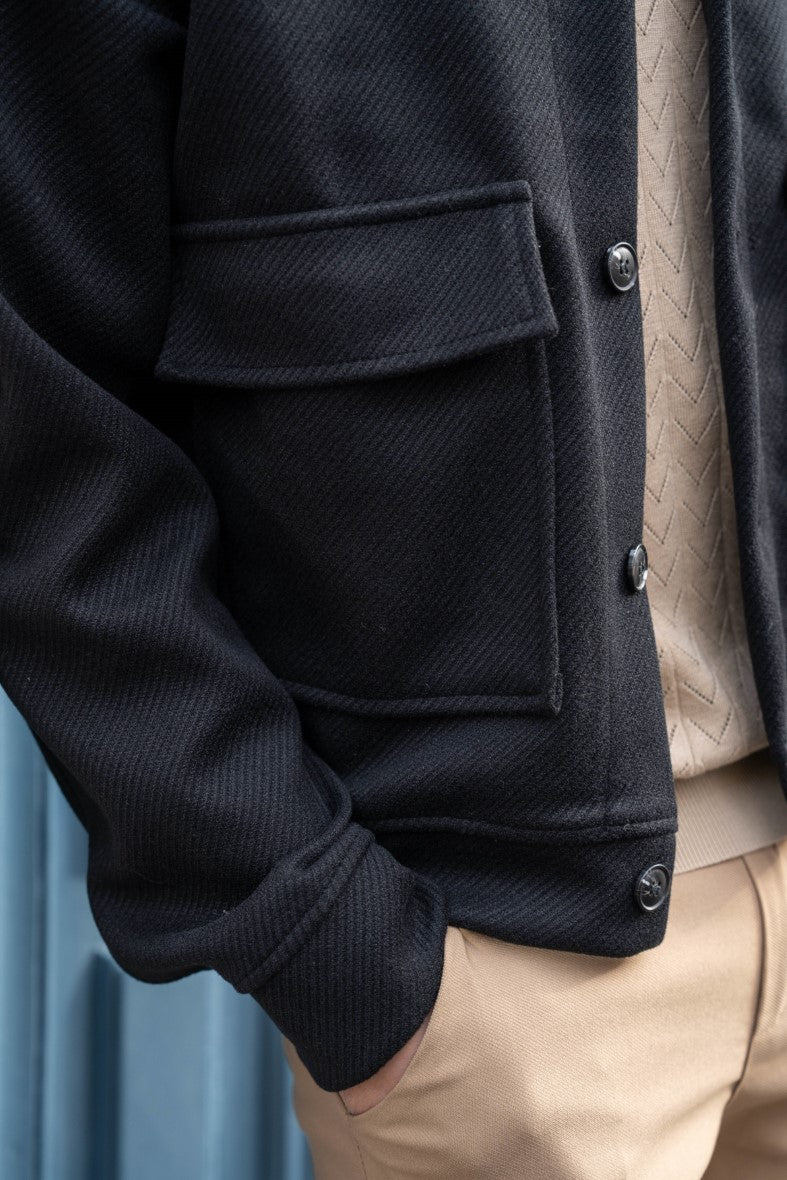 Plain textured jacket with large flap pockets