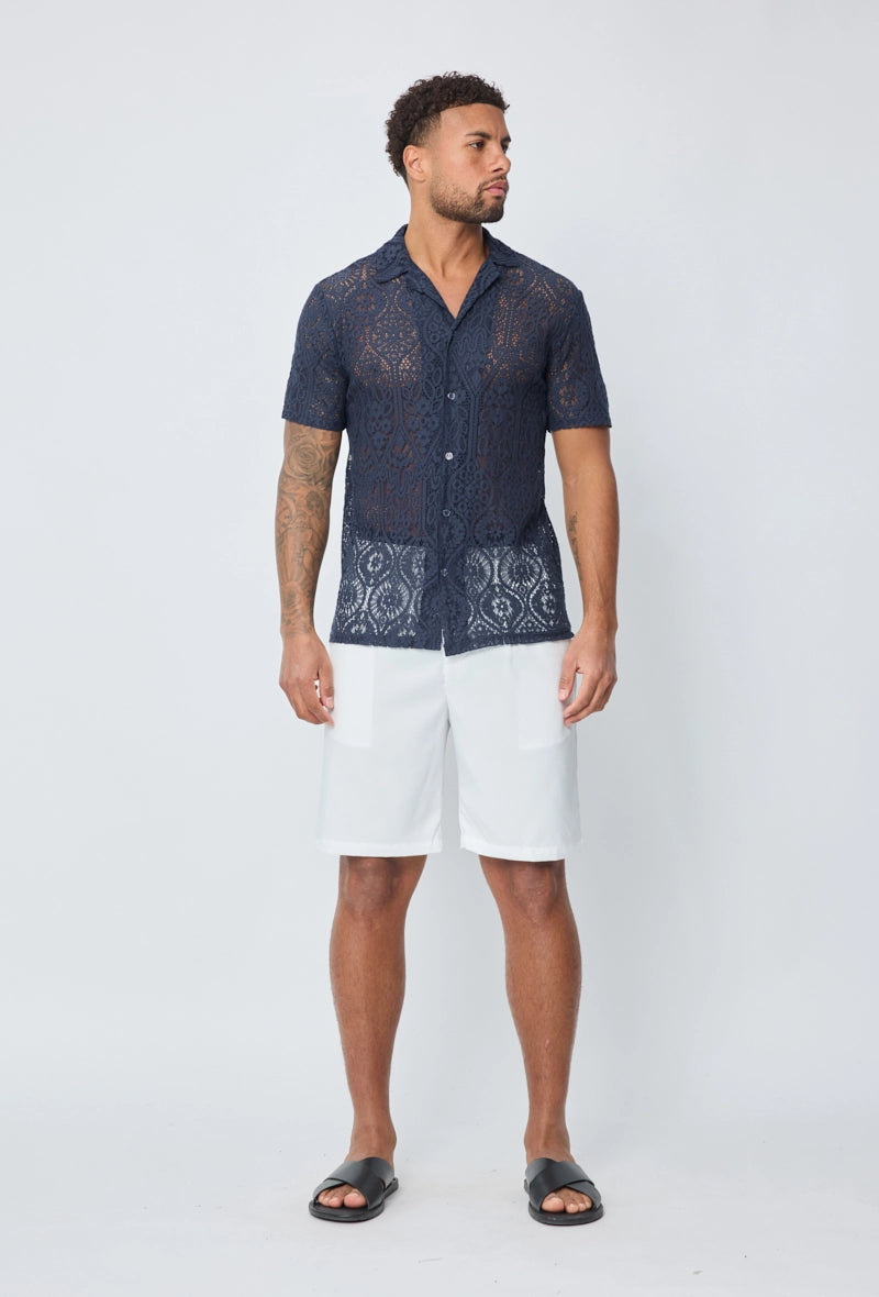Chemise unie manches courtes