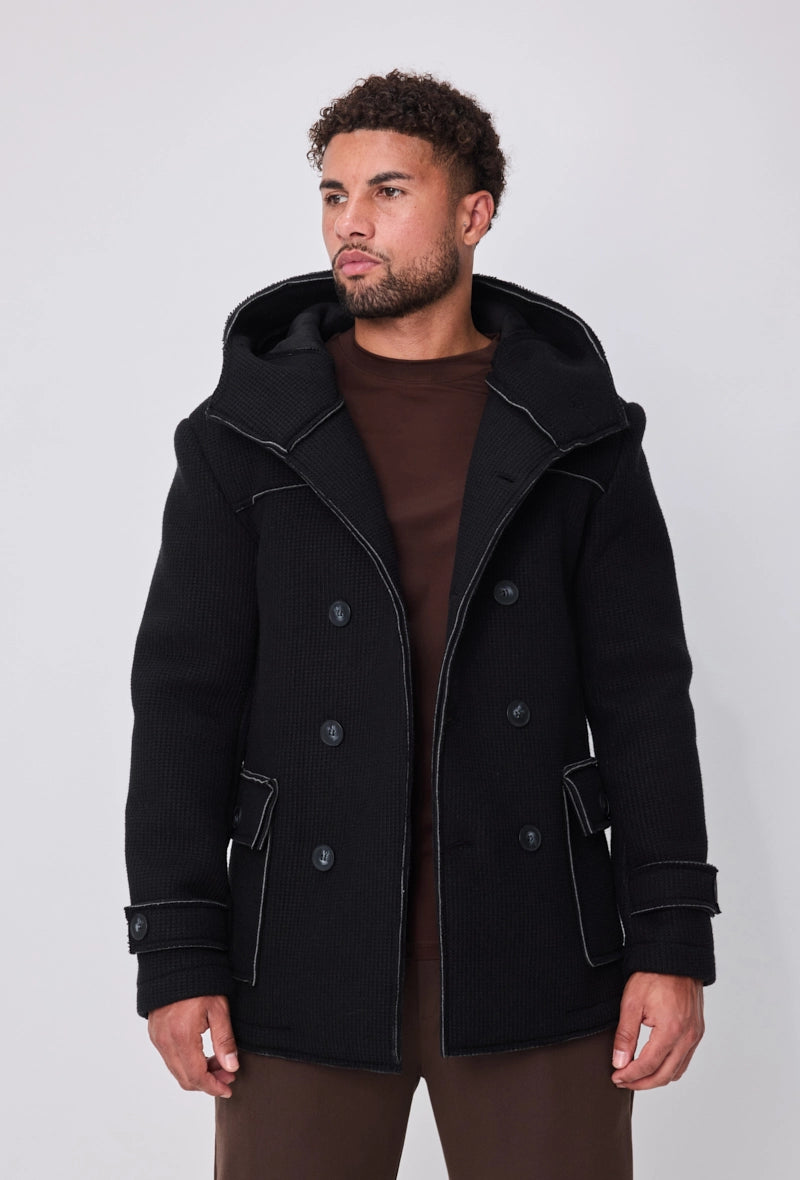 Manteau avec capuche et col large