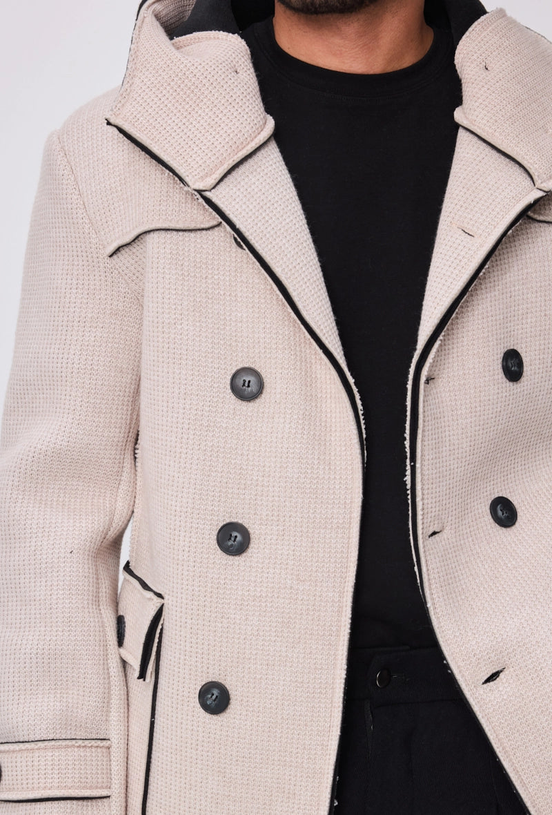 Manteau avec capuche et col large