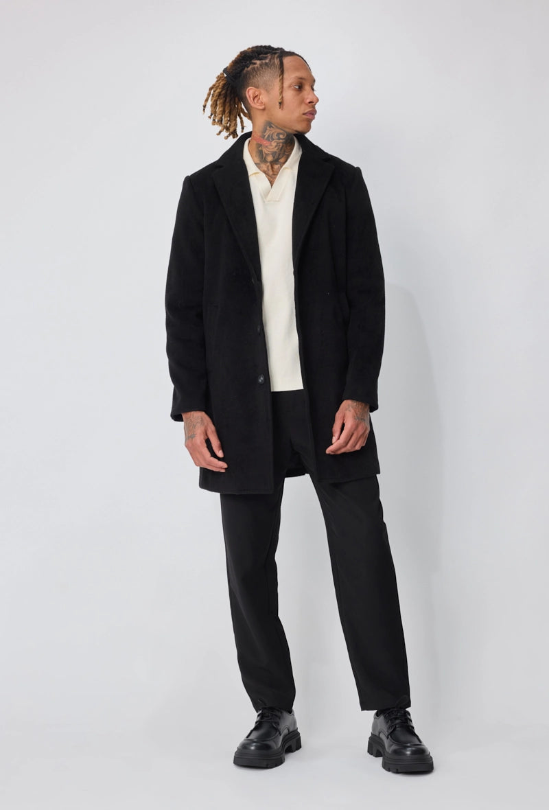 Manteau homme chic uni