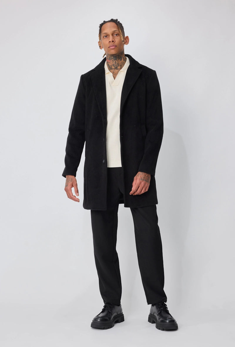 Manteau homme chic uni