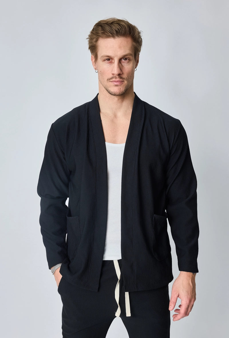Veste uni fluide confortable avec motif à rayures