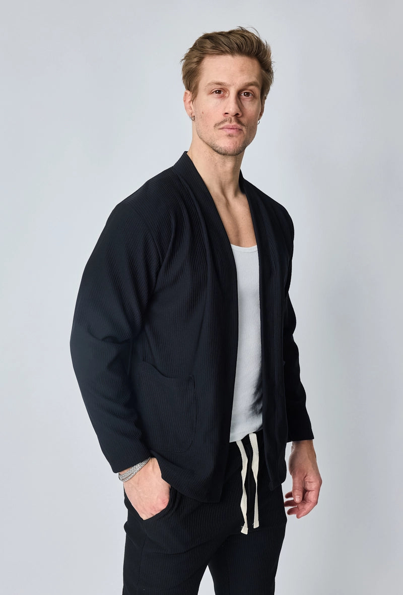 Veste uni fluide confortable avec motif à rayures