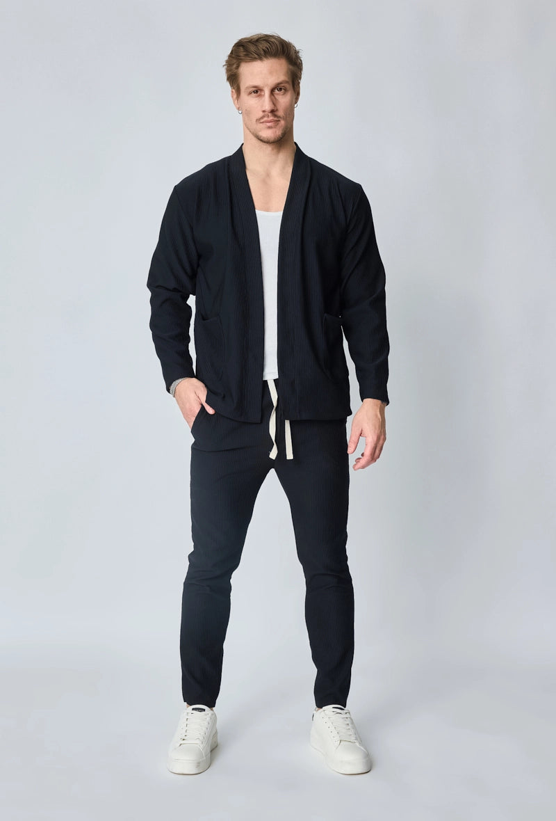 Veste uni fluide confortable avec motif à rayures