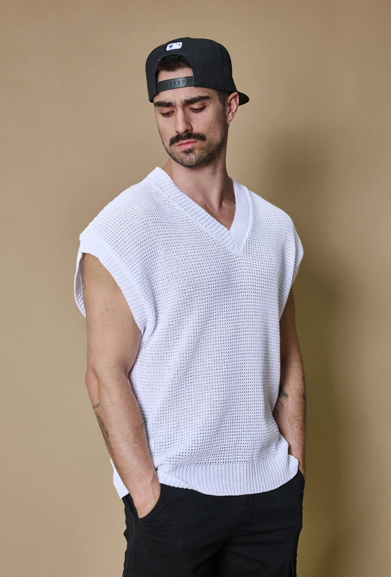 Plain sleeveless knit sweater