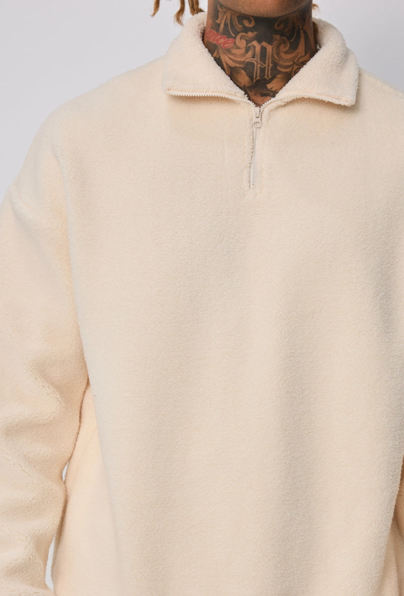 Sweat uni à zip col à revers