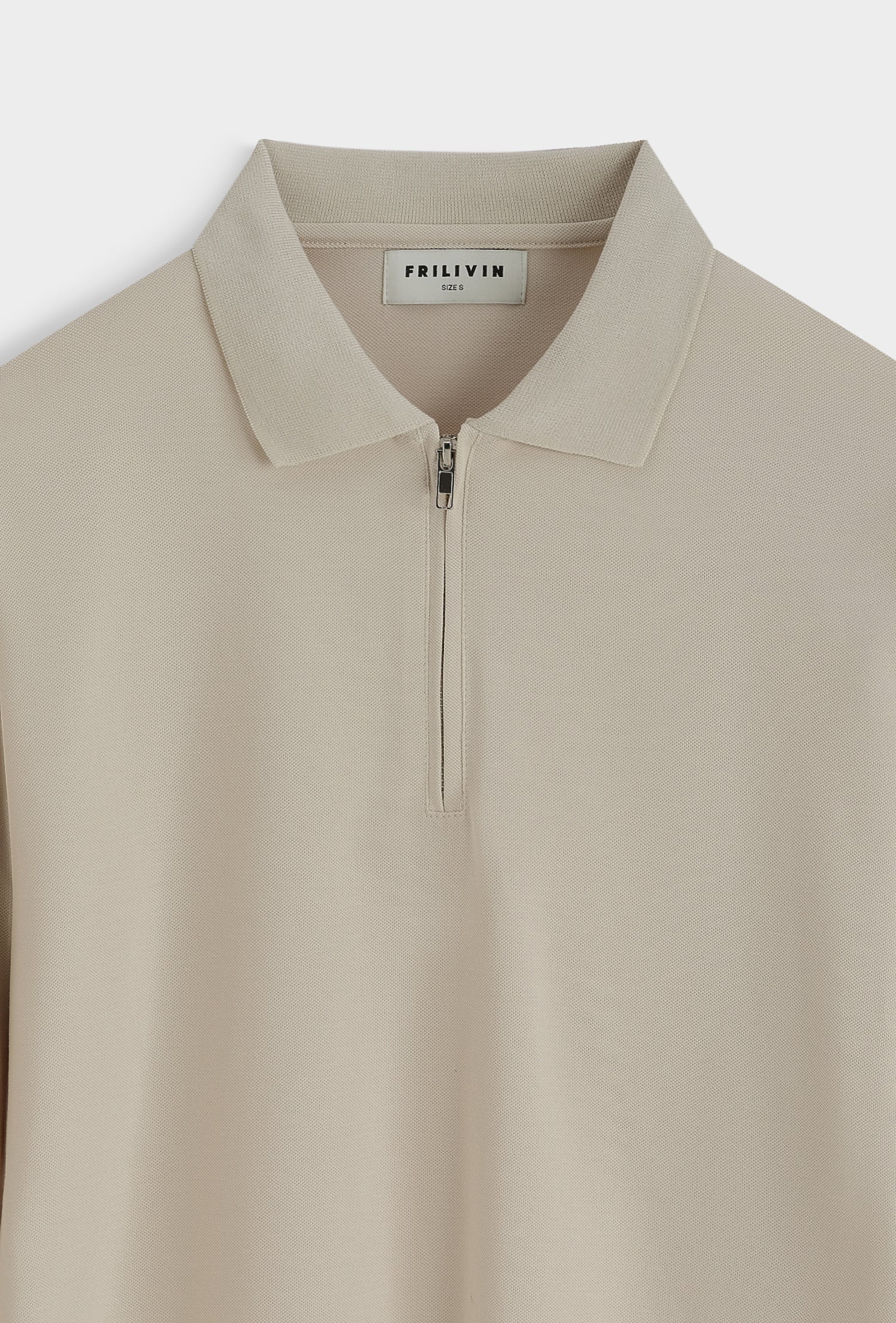 Polo zippé slim