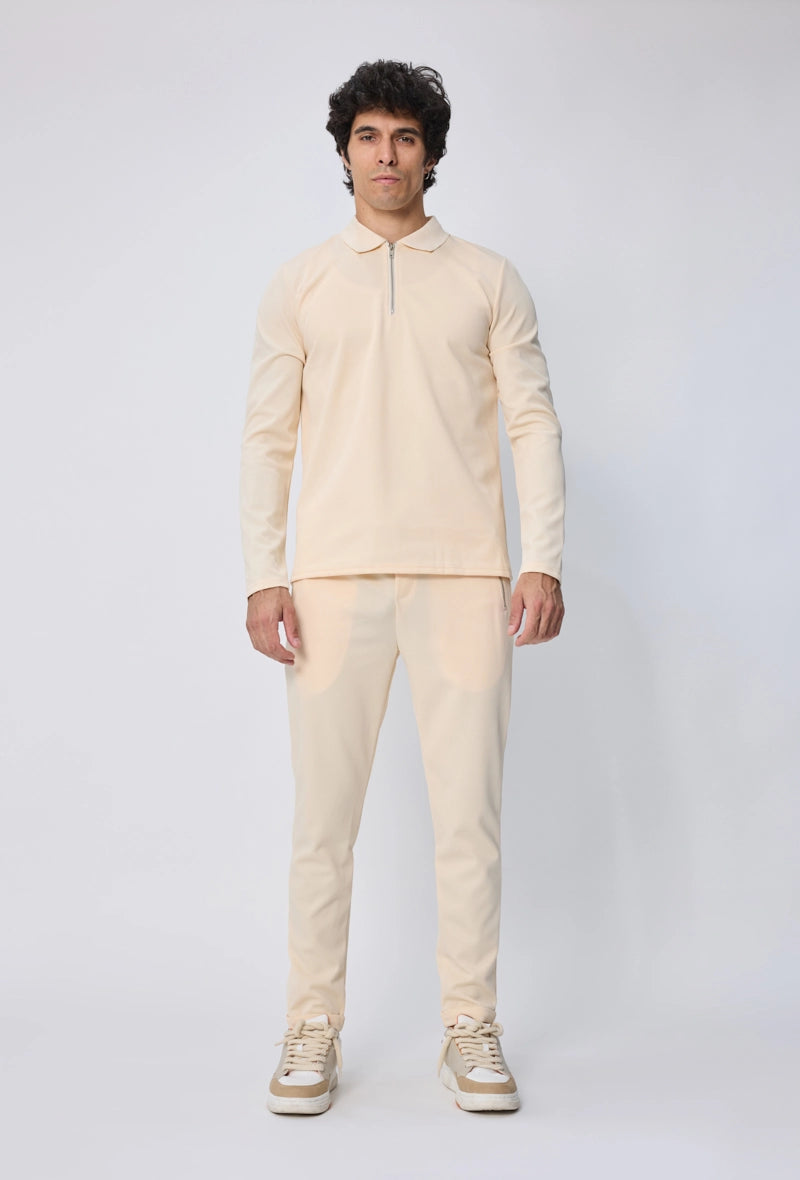 Ensemble polo manches longues à zip uni avec pantalon uni