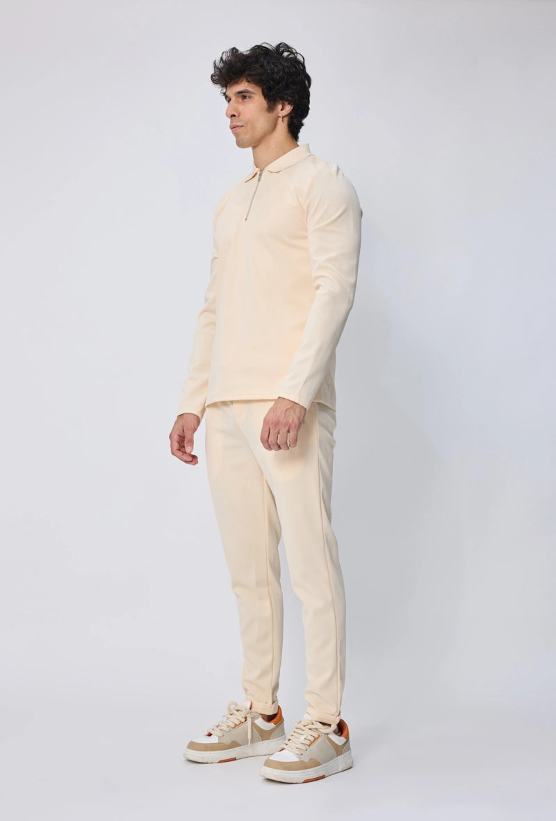 Ensemble polo manches longues à zip uni avec pantalon uni