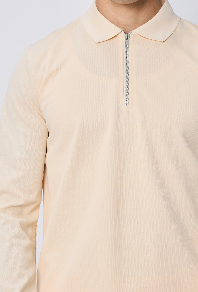 Ensemble polo manches longues à zip uni avec pantalon uni