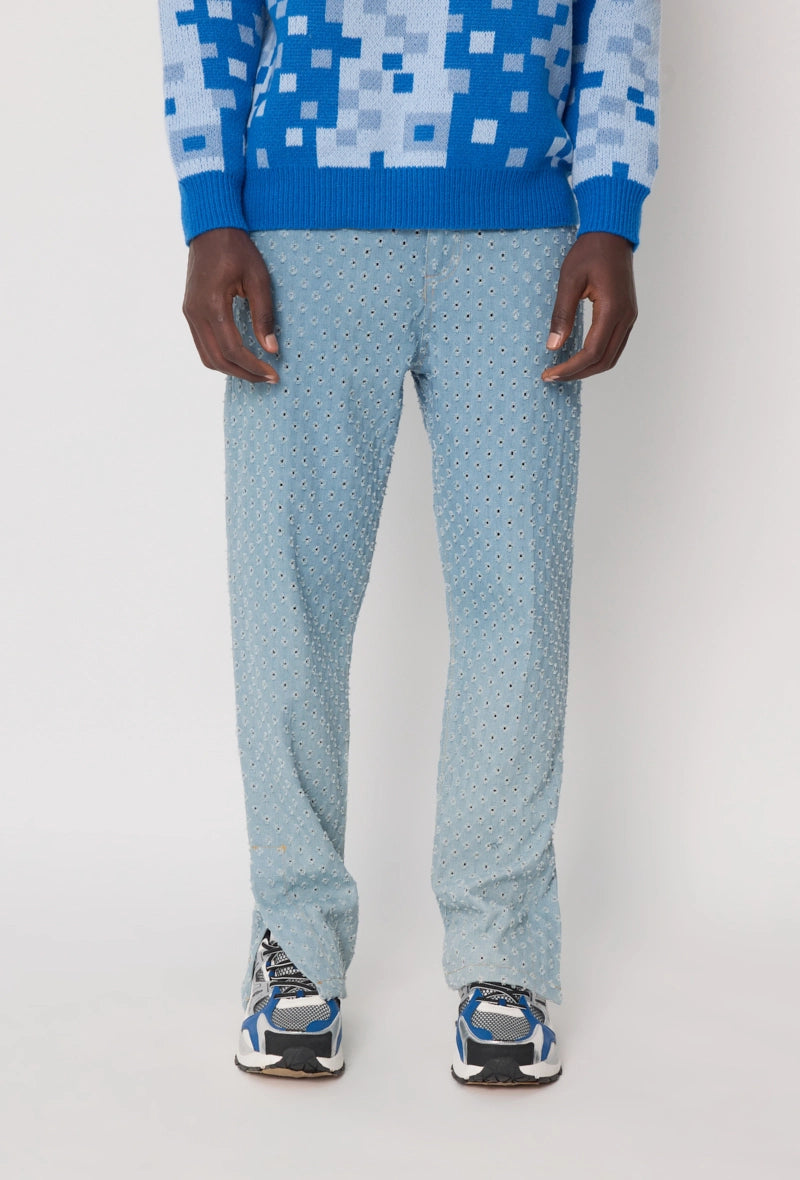 Jean large à motifs troués