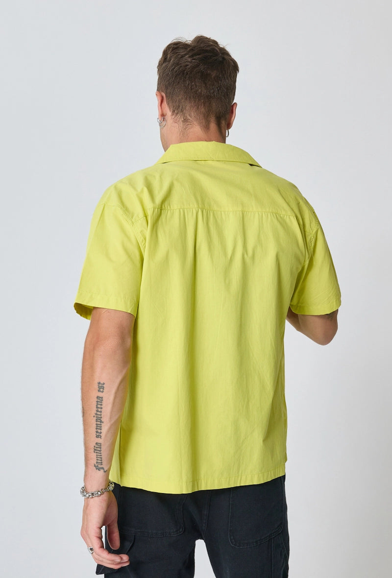 Chemise unie manches courtes