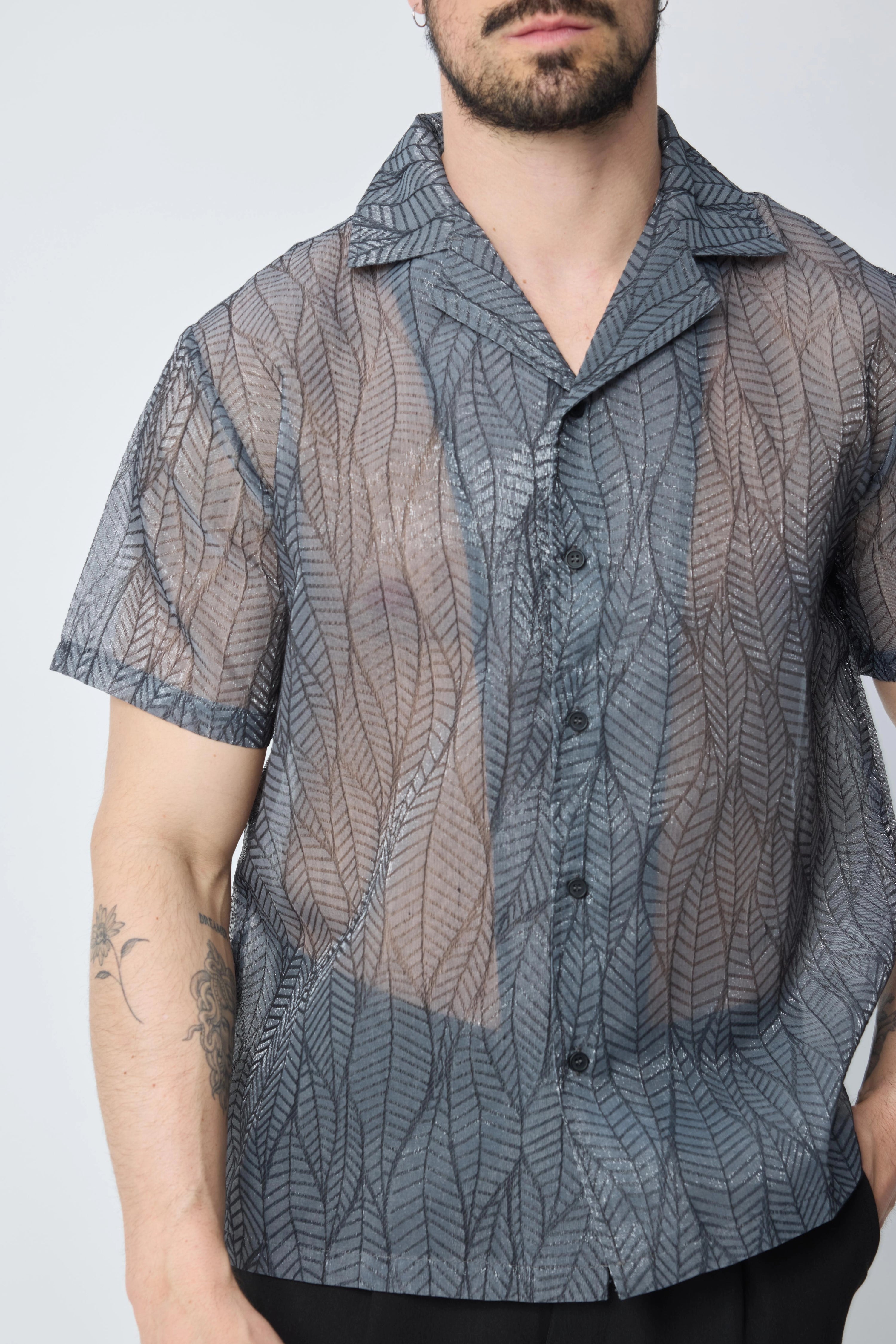 Chemise à manches courtes transparente