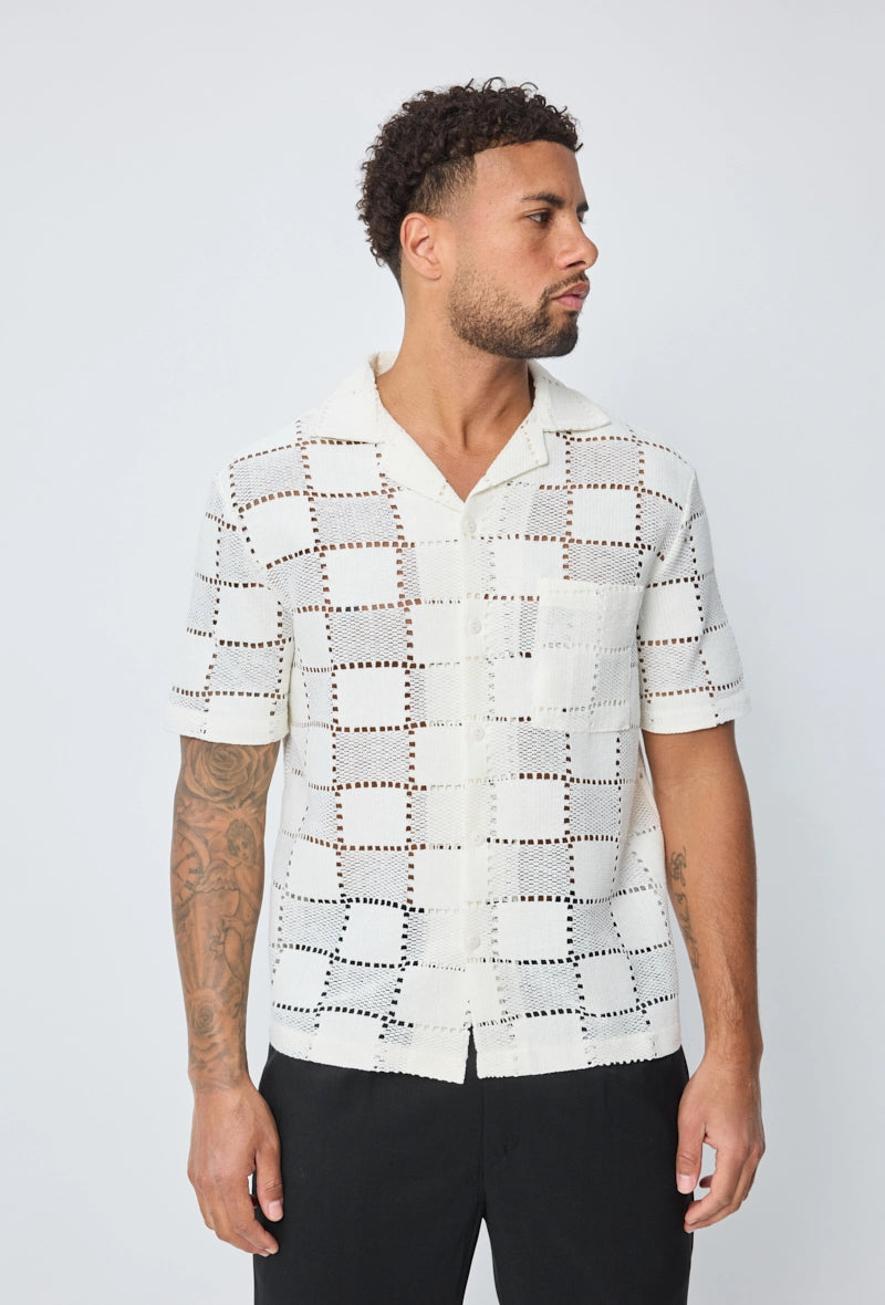 Chemise trouée manches courtes à boutons