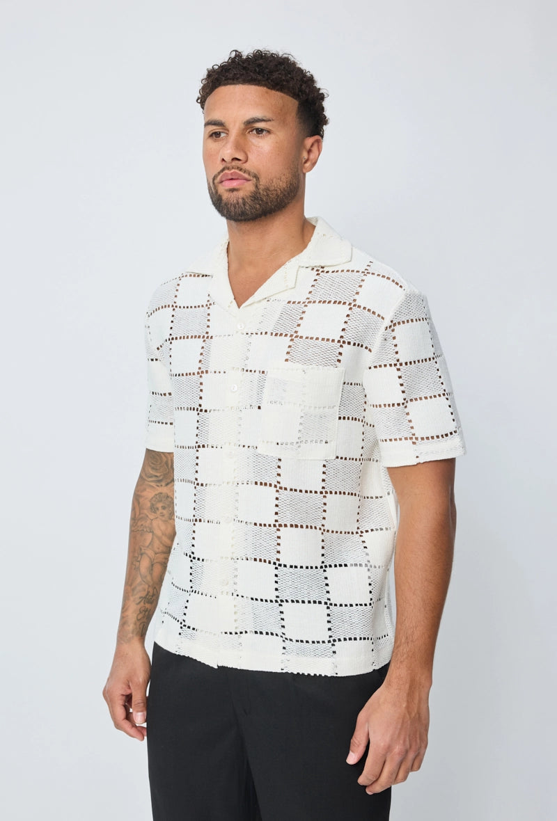 Chemise trouée manches courtes à boutons