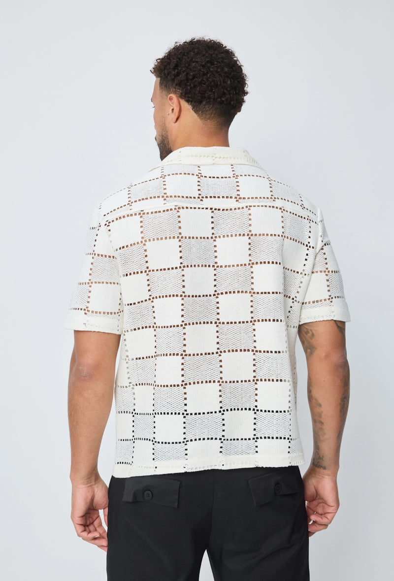 Chemise trouée manches courtes à boutons