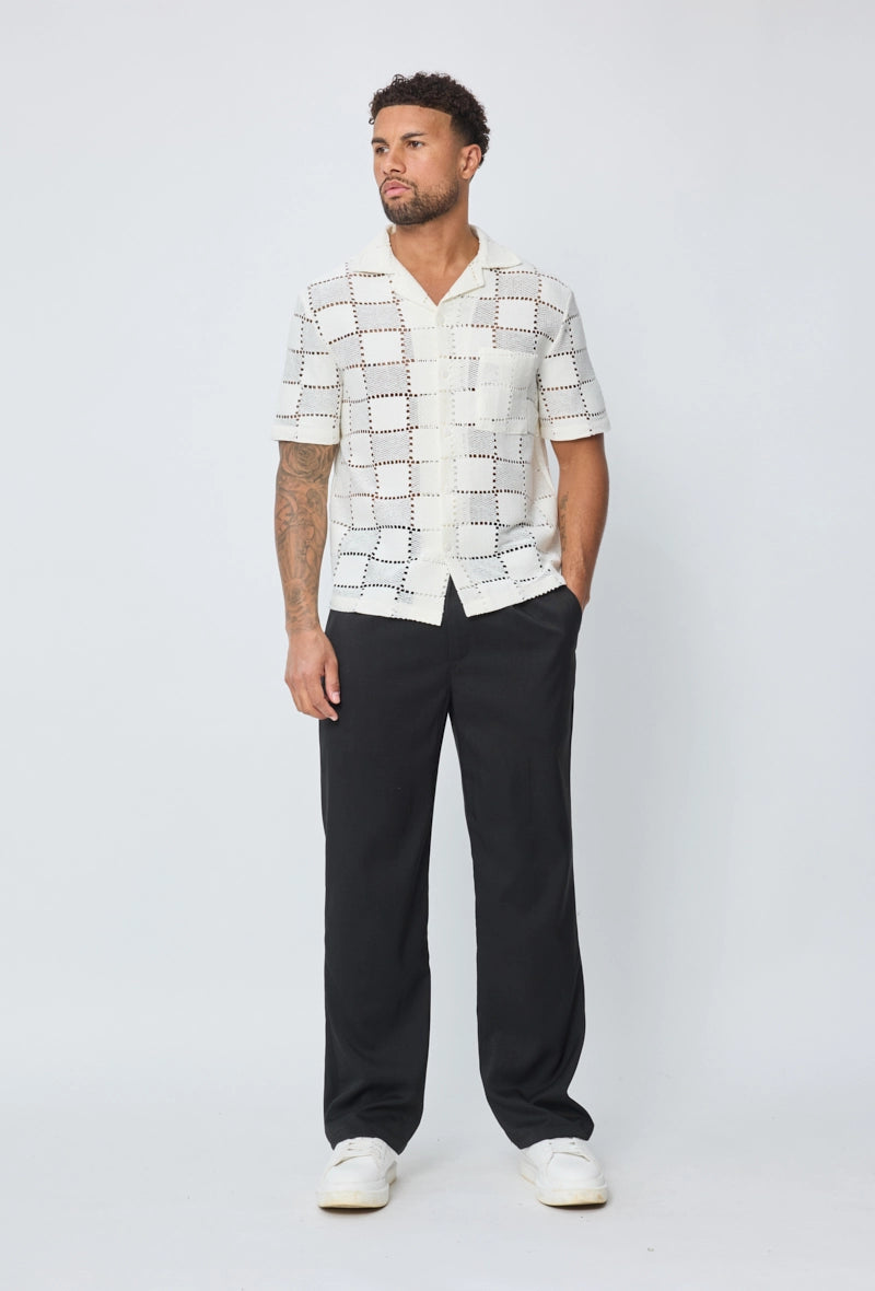 Chemise trouée manches courtes à boutons