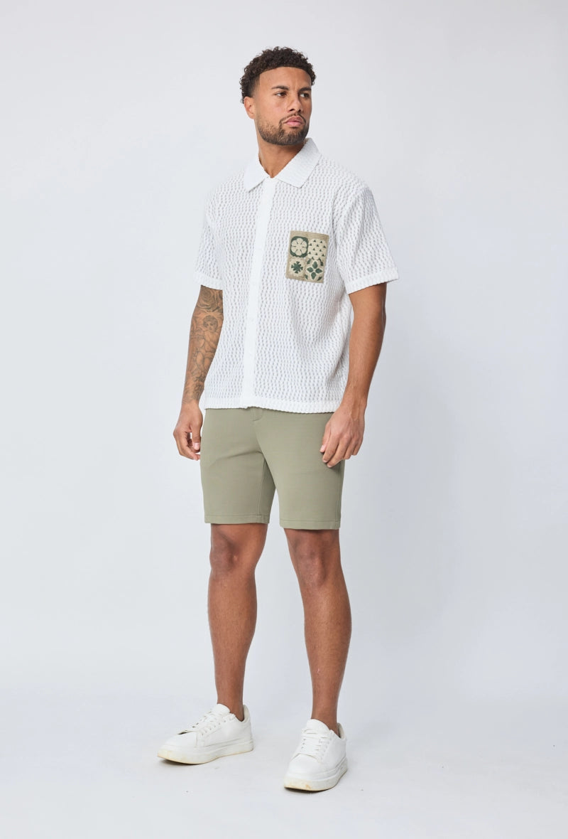 Chemise manches courtes à boutons