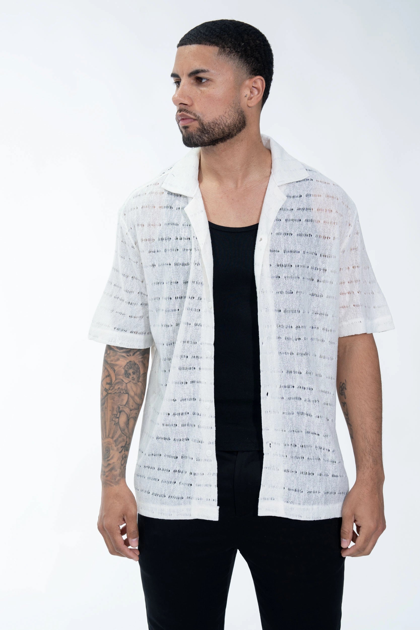 Chemise en maille transparente manches courtes col à revers