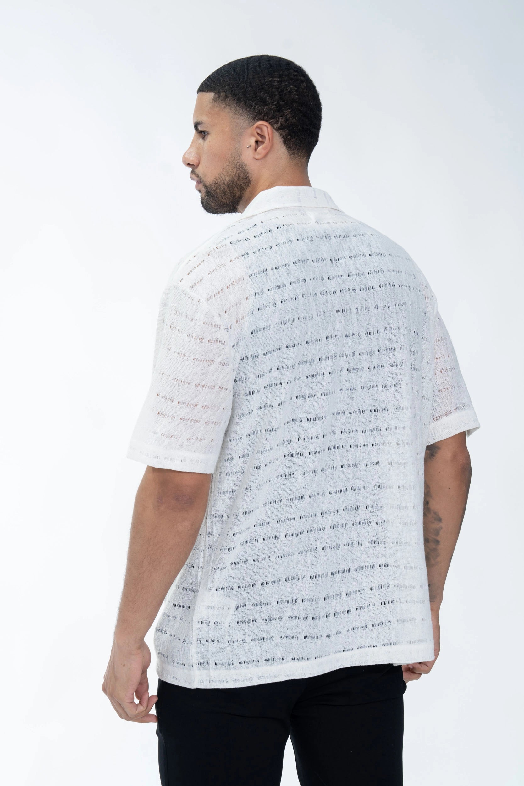 Chemise en maille transparente manches courtes col à revers