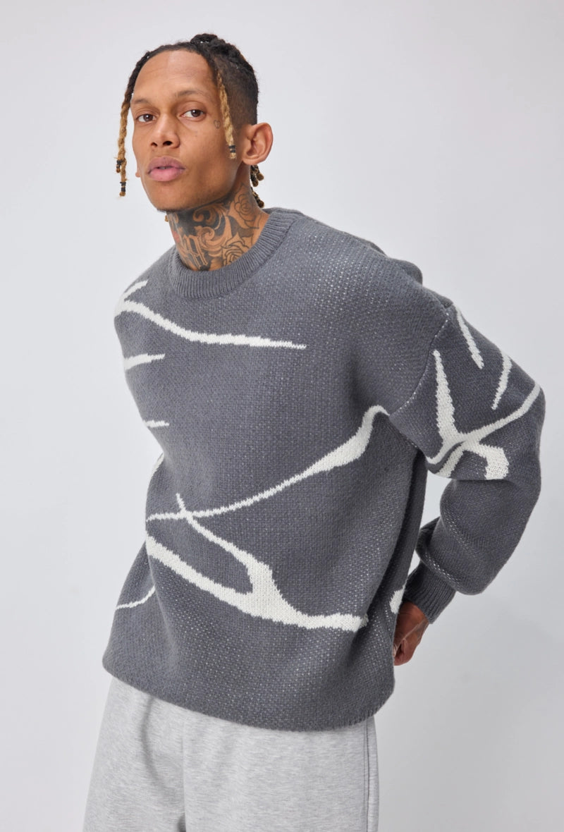 Pull col rond à motif branche d'arbre sur l'ensemble du pull