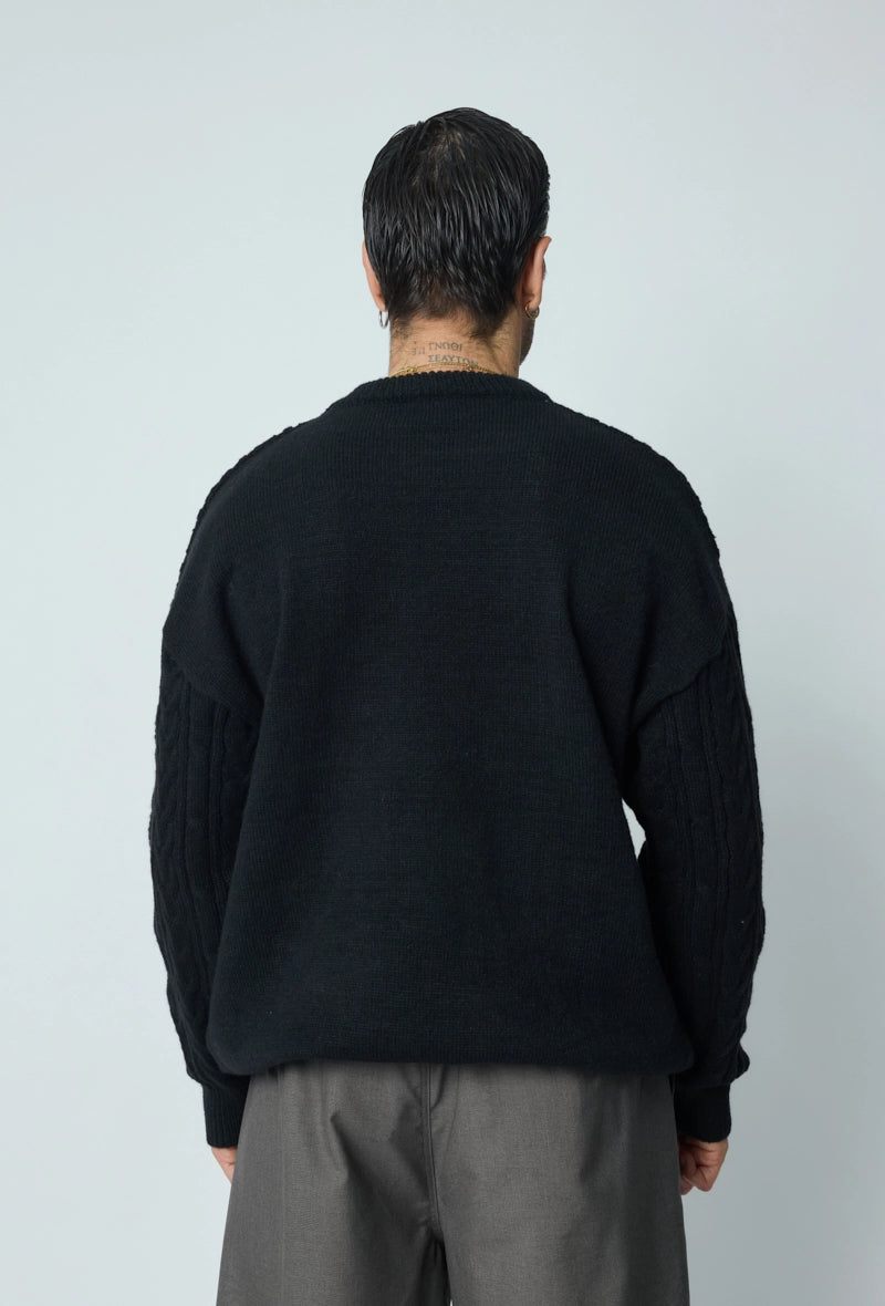 Pull tréssé à col rond