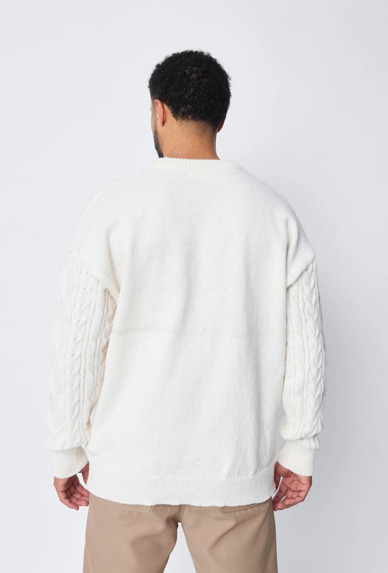 Pull tréssé à col rond