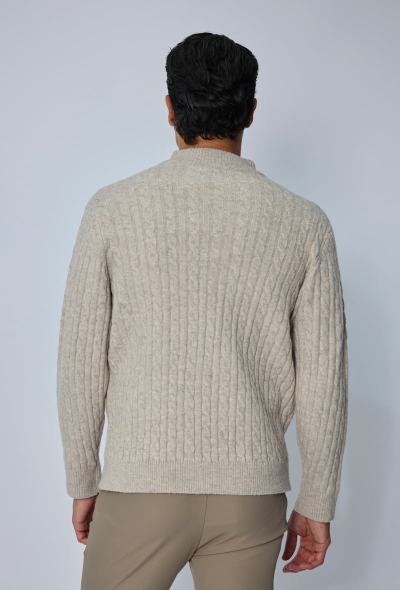 Pull torsadé col zippé