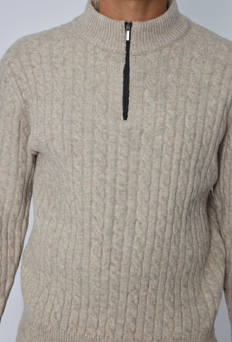 Pull torsadé col zippé