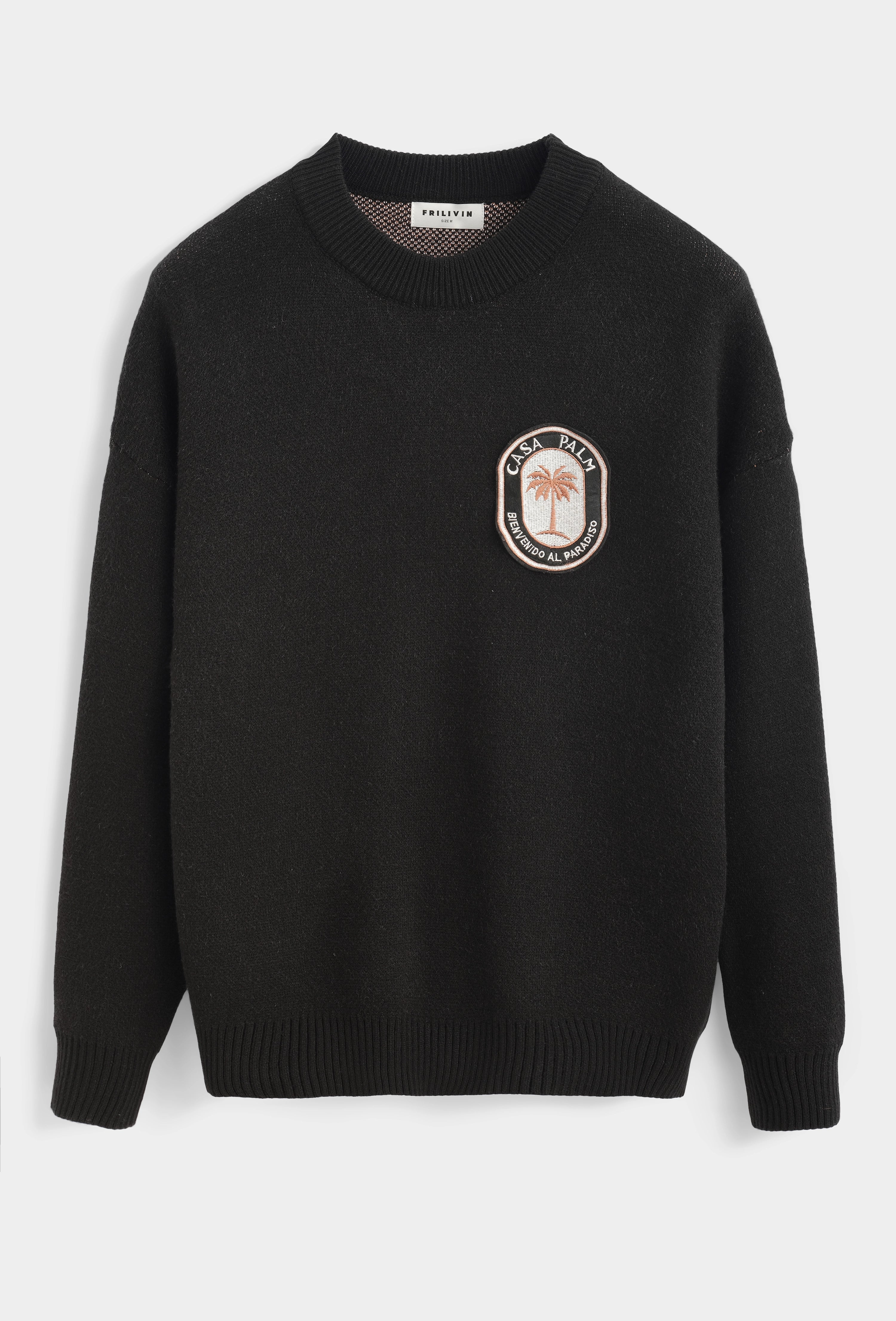 Pull en maille à col rond avec patch brodé sur la poitrine