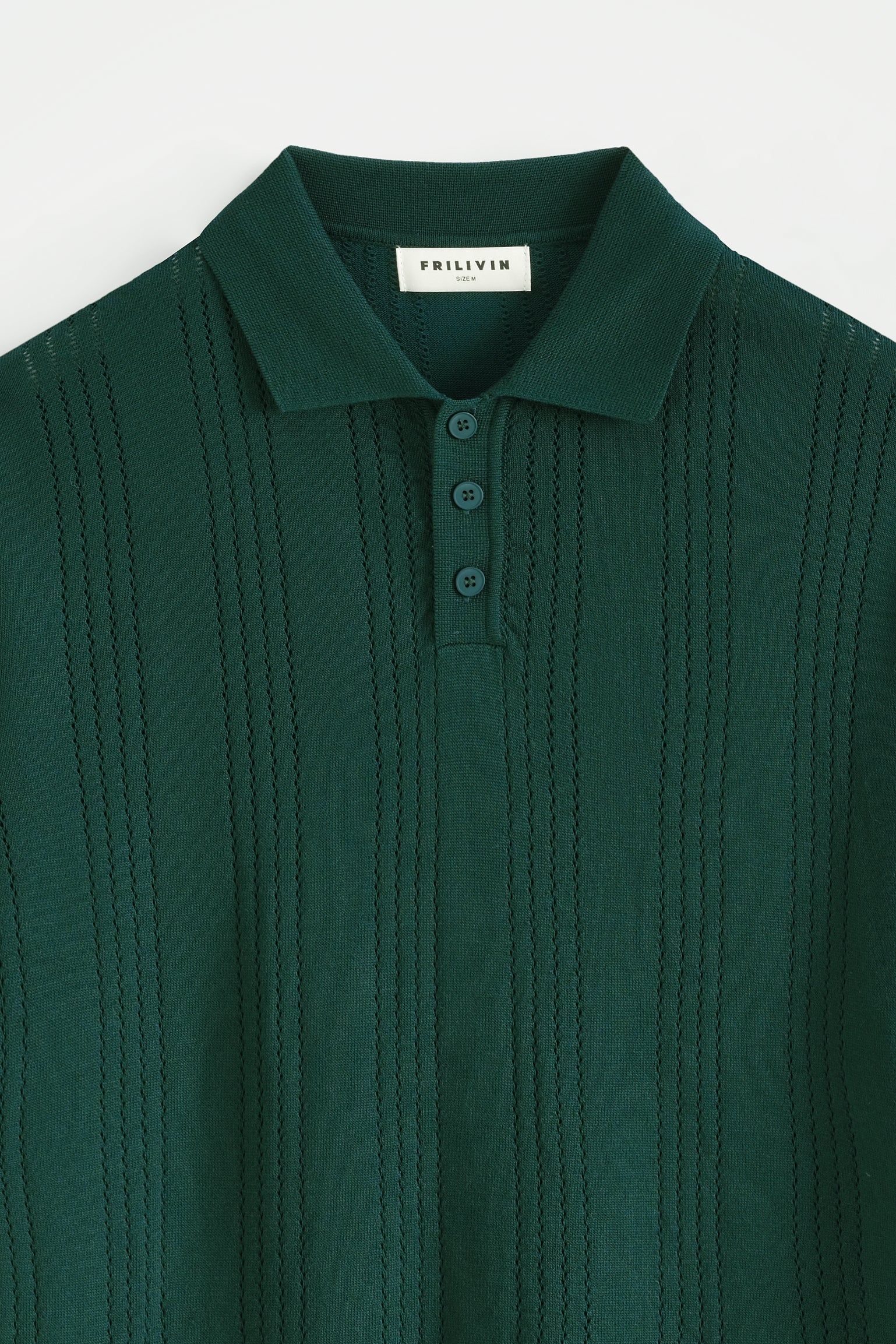 Polo tricoté rayures verticales