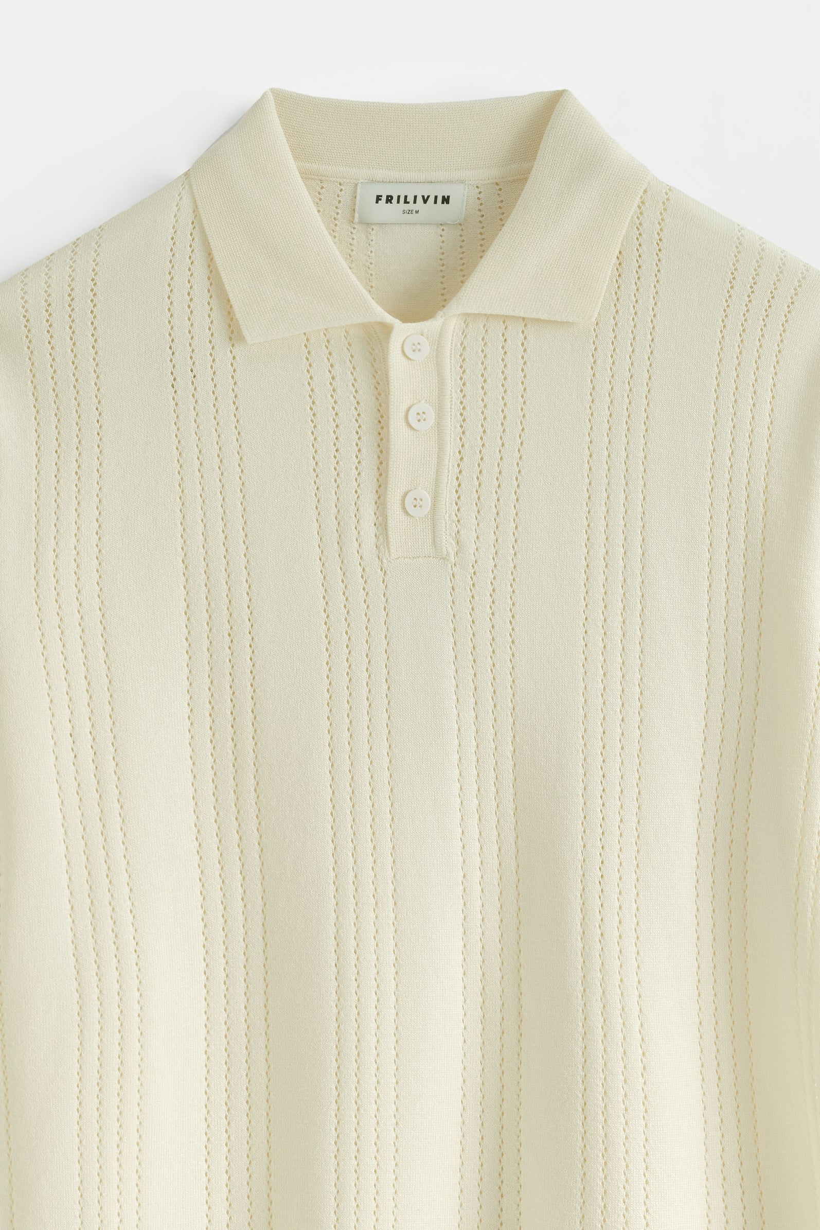 Polo tricoté rayures verticales