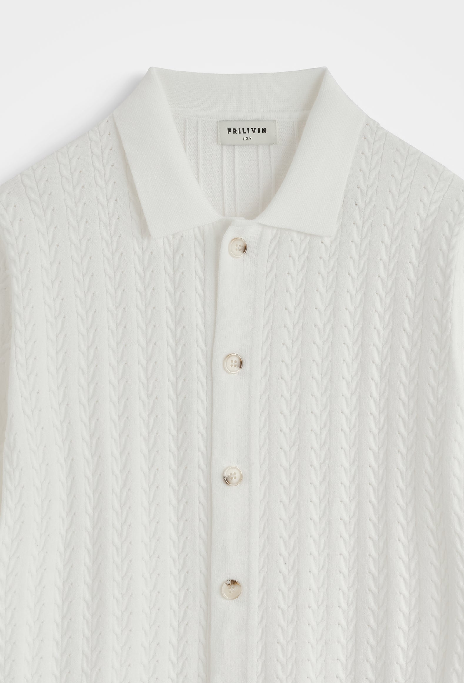 Polo tricoté tressé casual