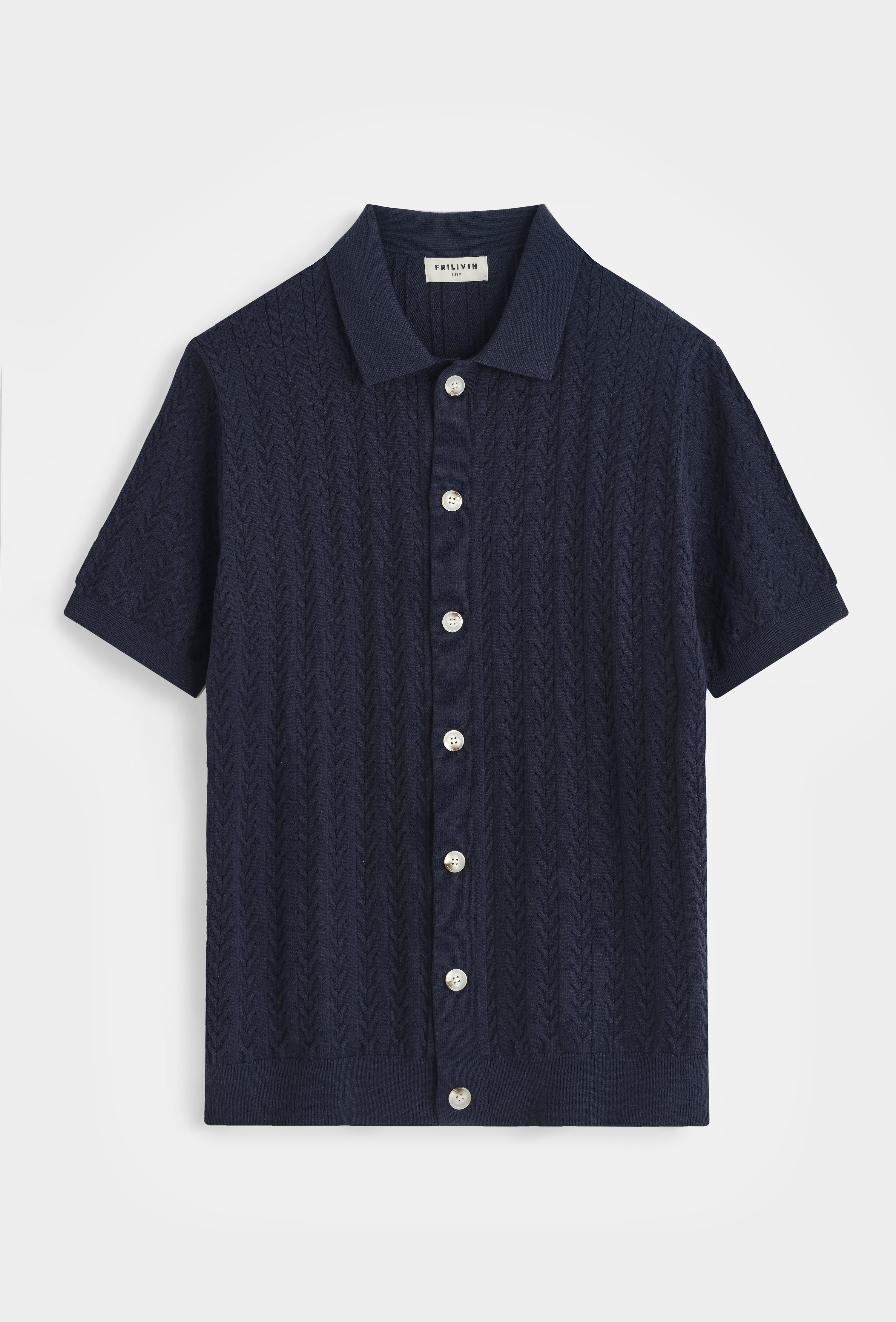Polo tricoté tressé casual