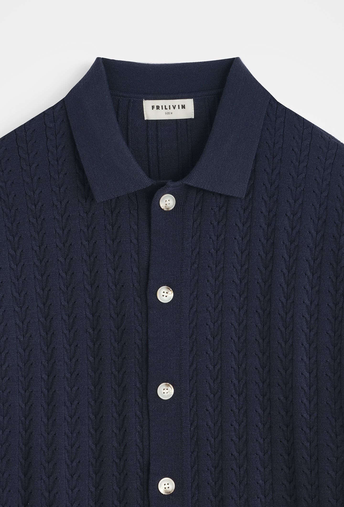 Polo tricoté tressé casual