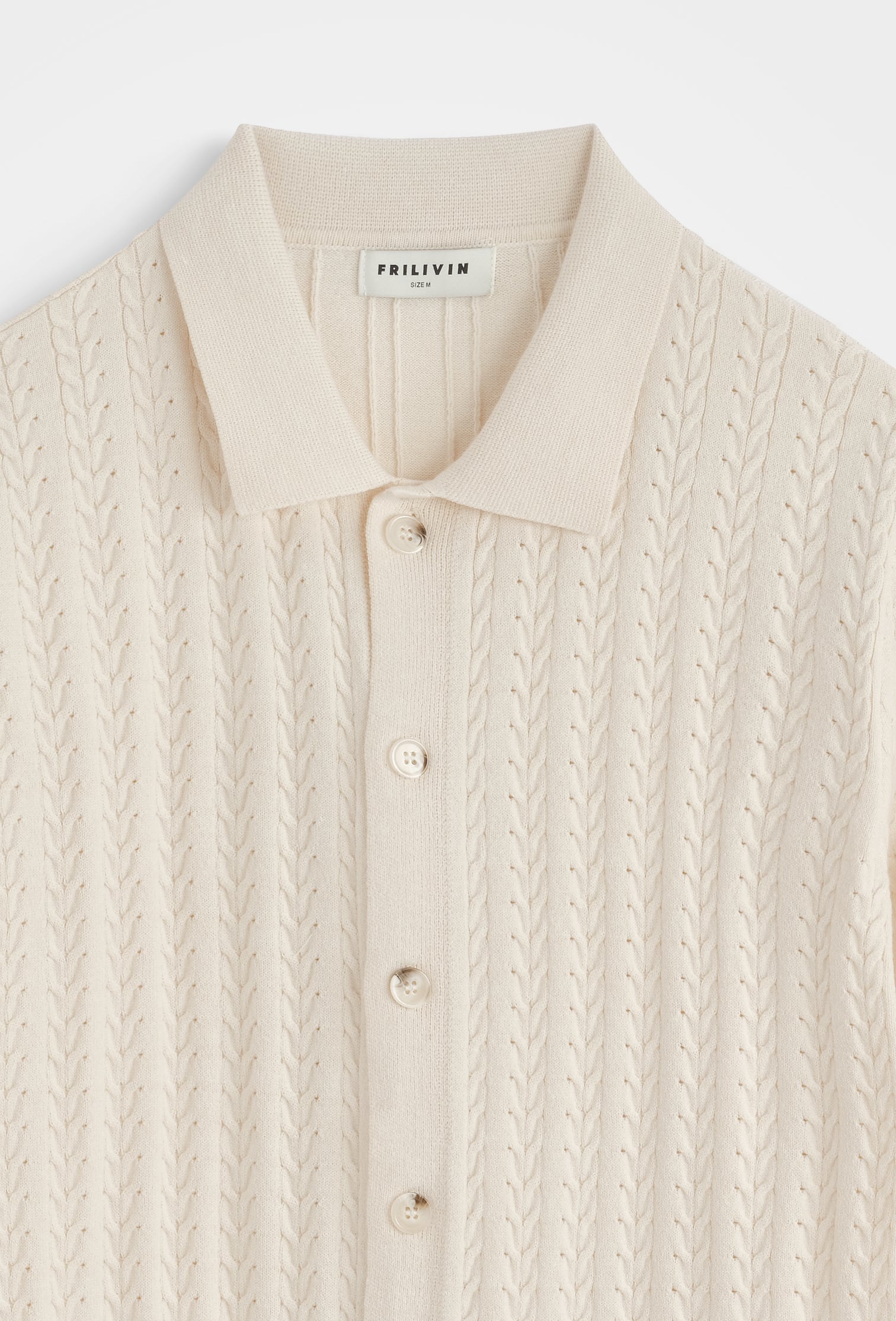 Polo tricoté tressé casual