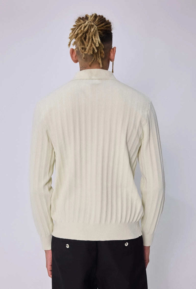 Pull col polo zippé côtelé