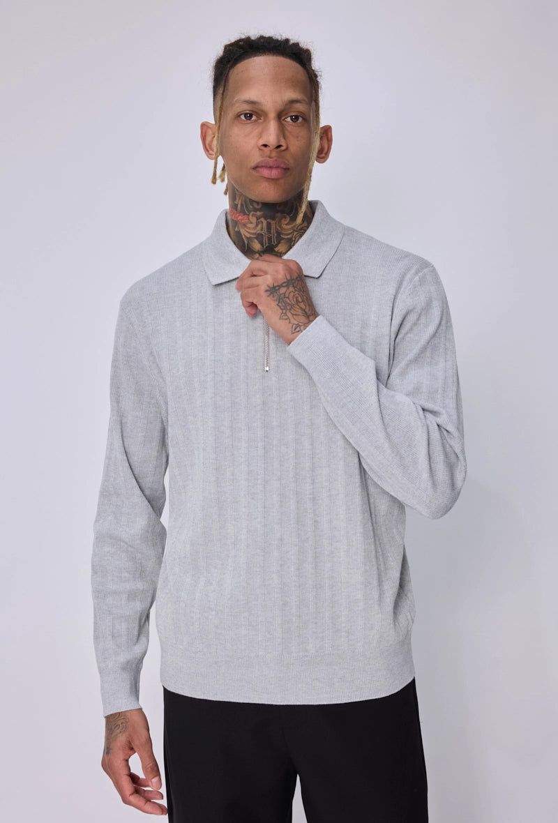 Pull col polo zippé côtelé