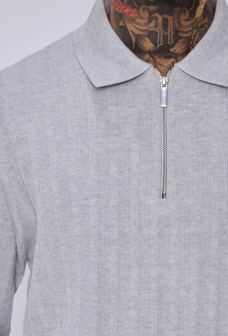 Pull col polo zippé côtelé