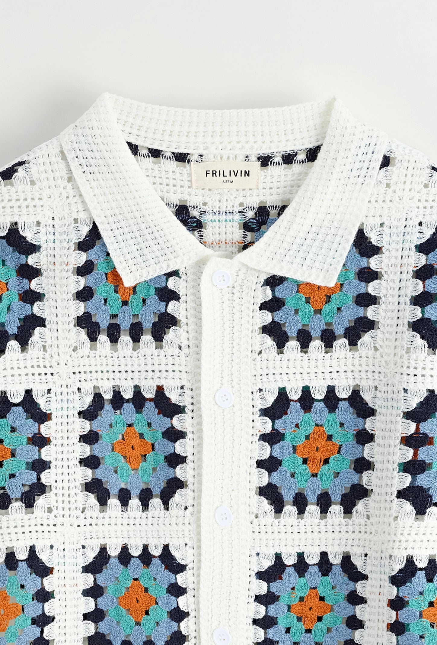 Chemise ajourée à boutons