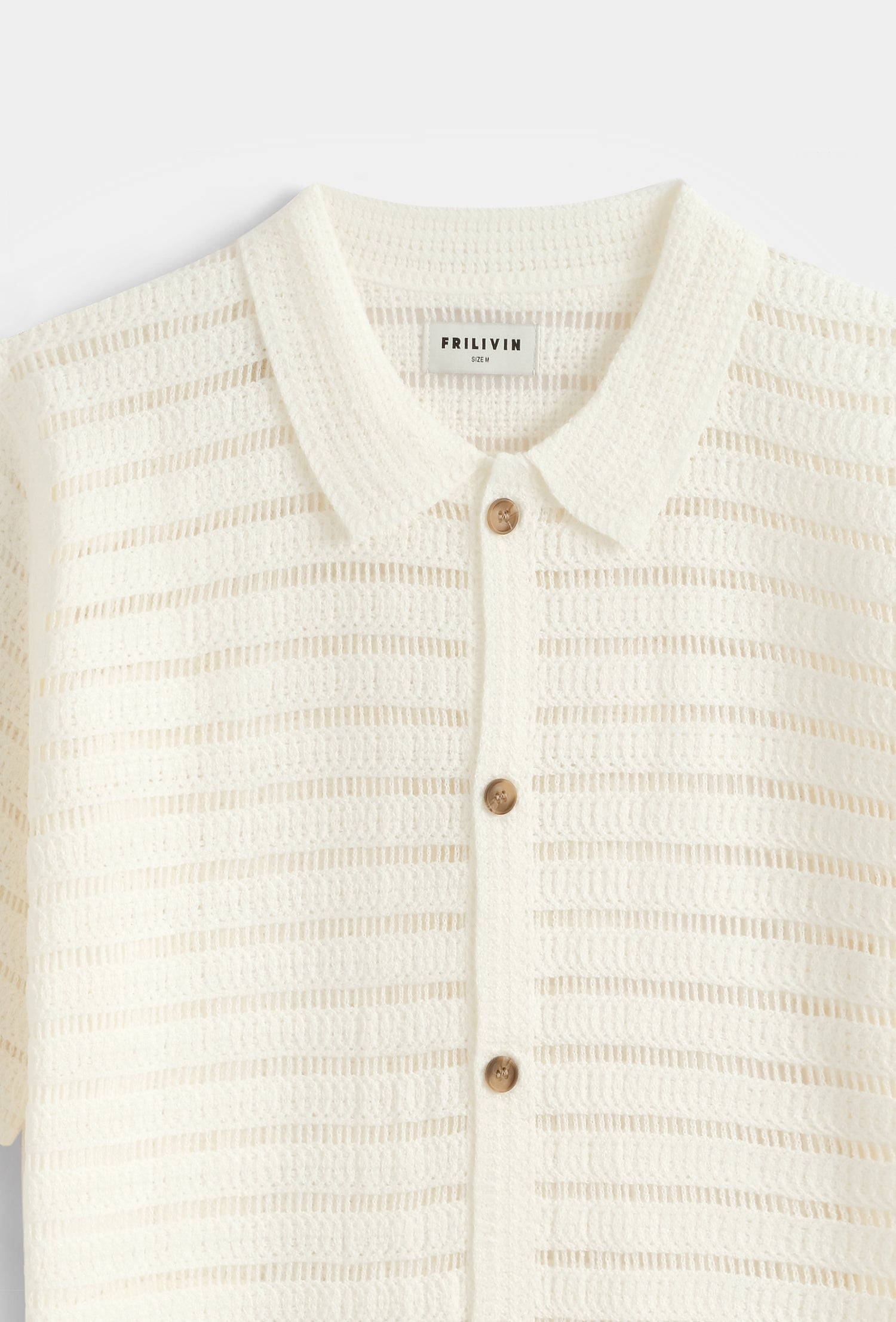 Chemise polo tricot rayé