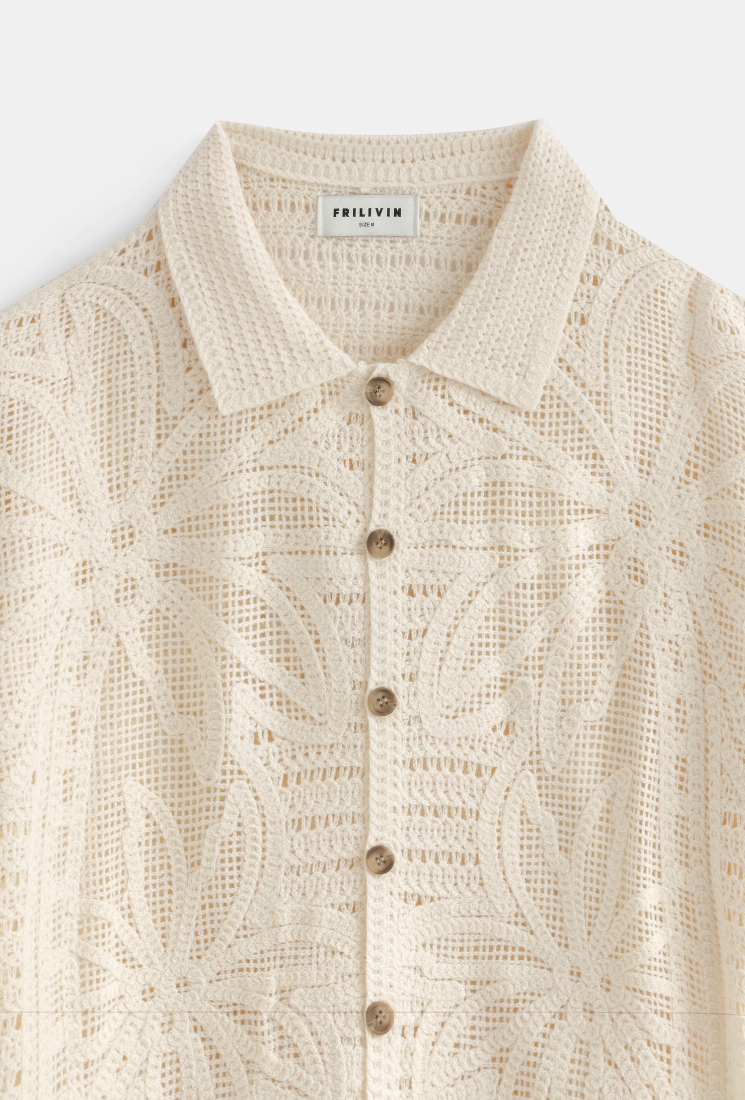 Chemise col polo ajourée