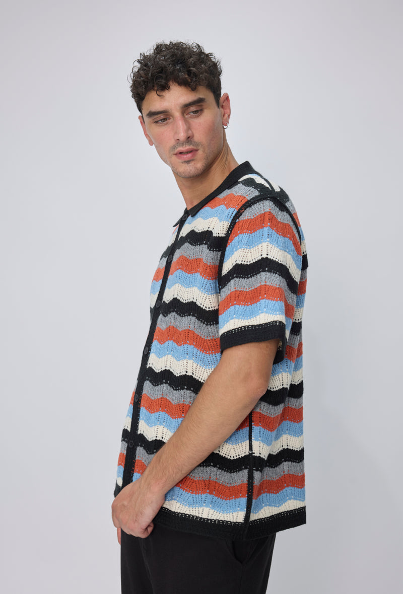 Polo tricoté rayures vagues