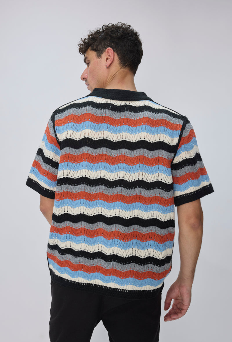 Polo tricoté rayures vagues