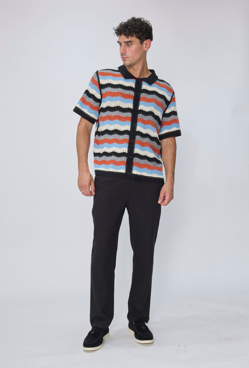 Polo tricoté rayures vagues