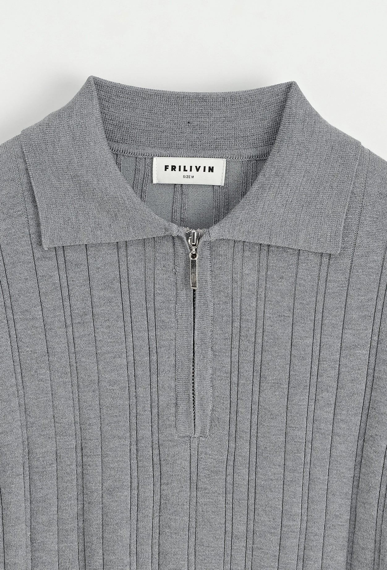 Polo uni effet rayé