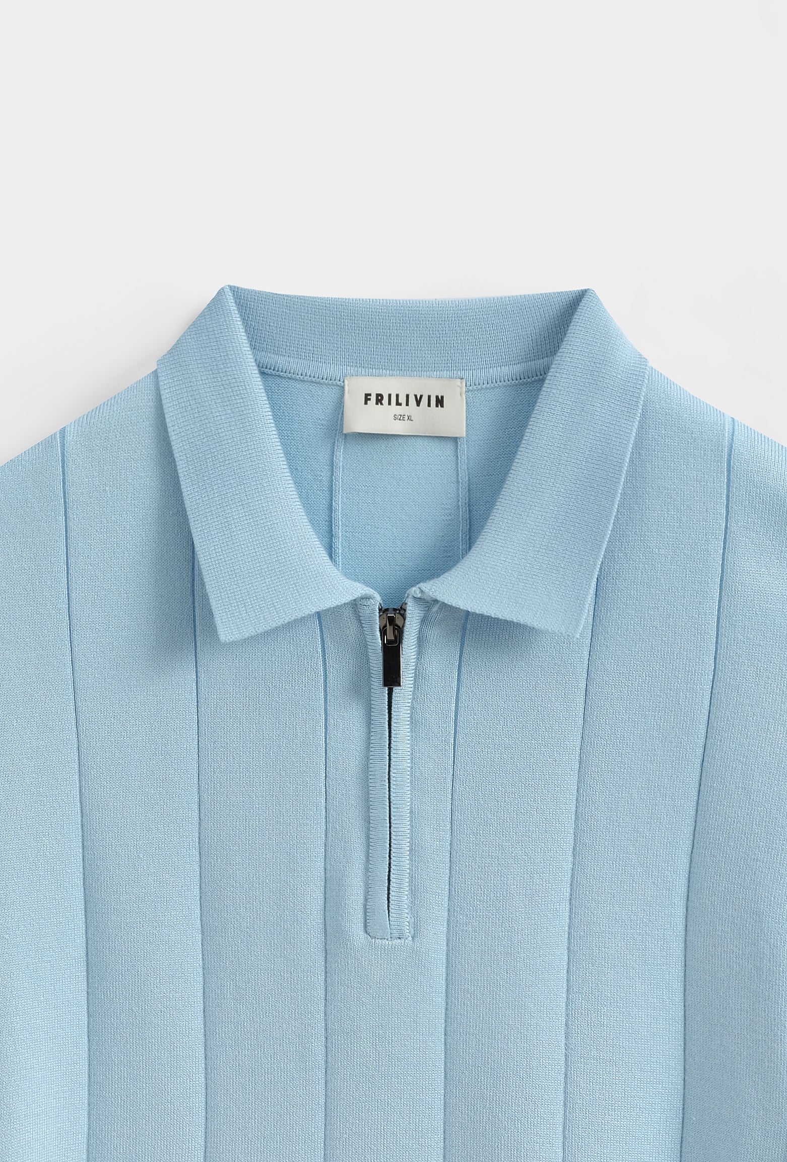 Polo zippé rayures verticales