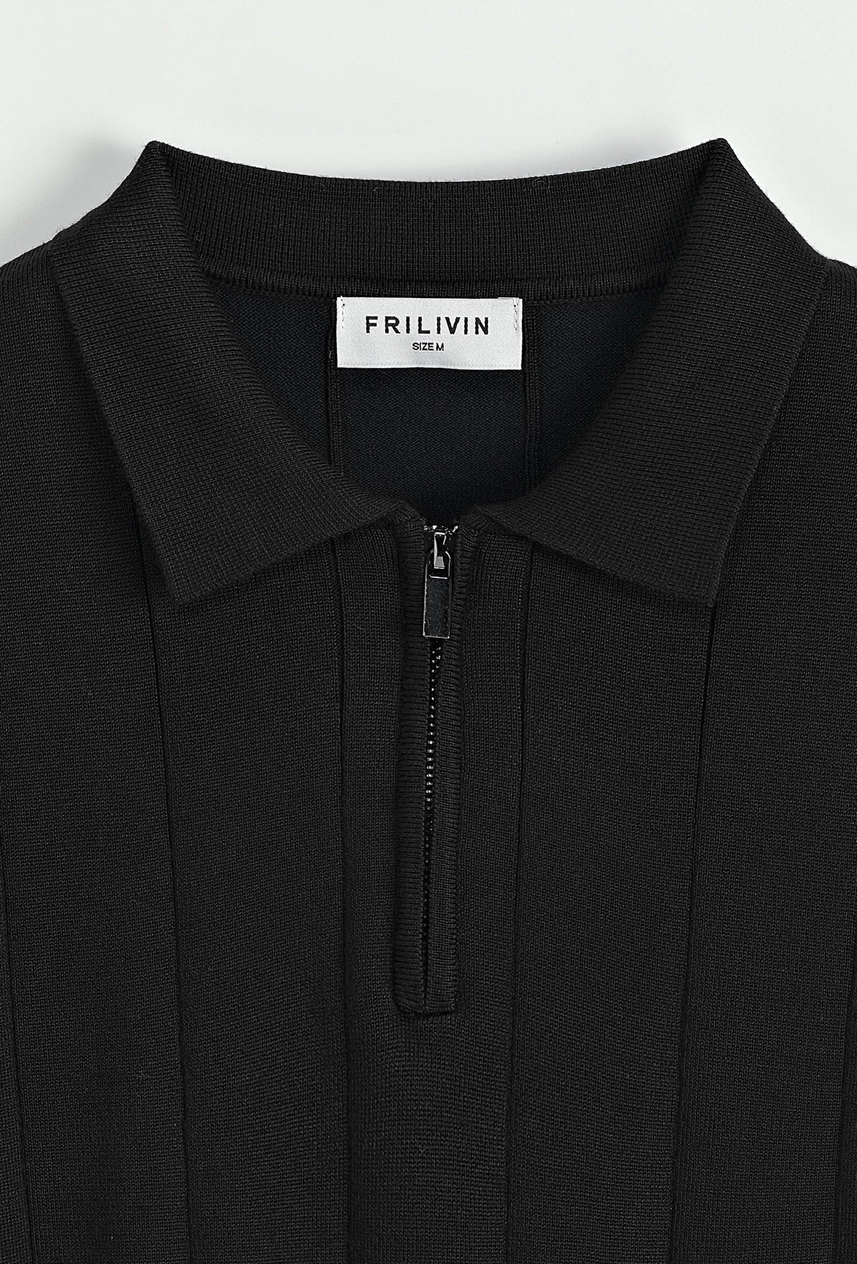Pull à col chemise zippé