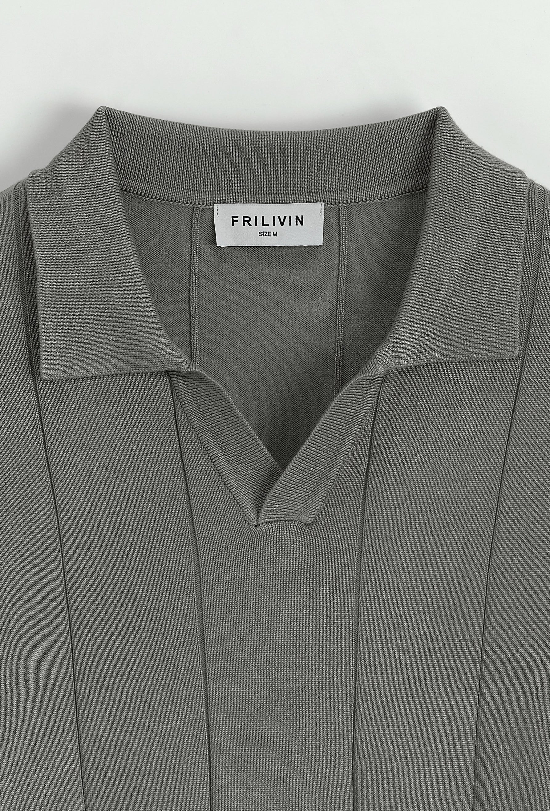 Pull à col chemise ouvert en V